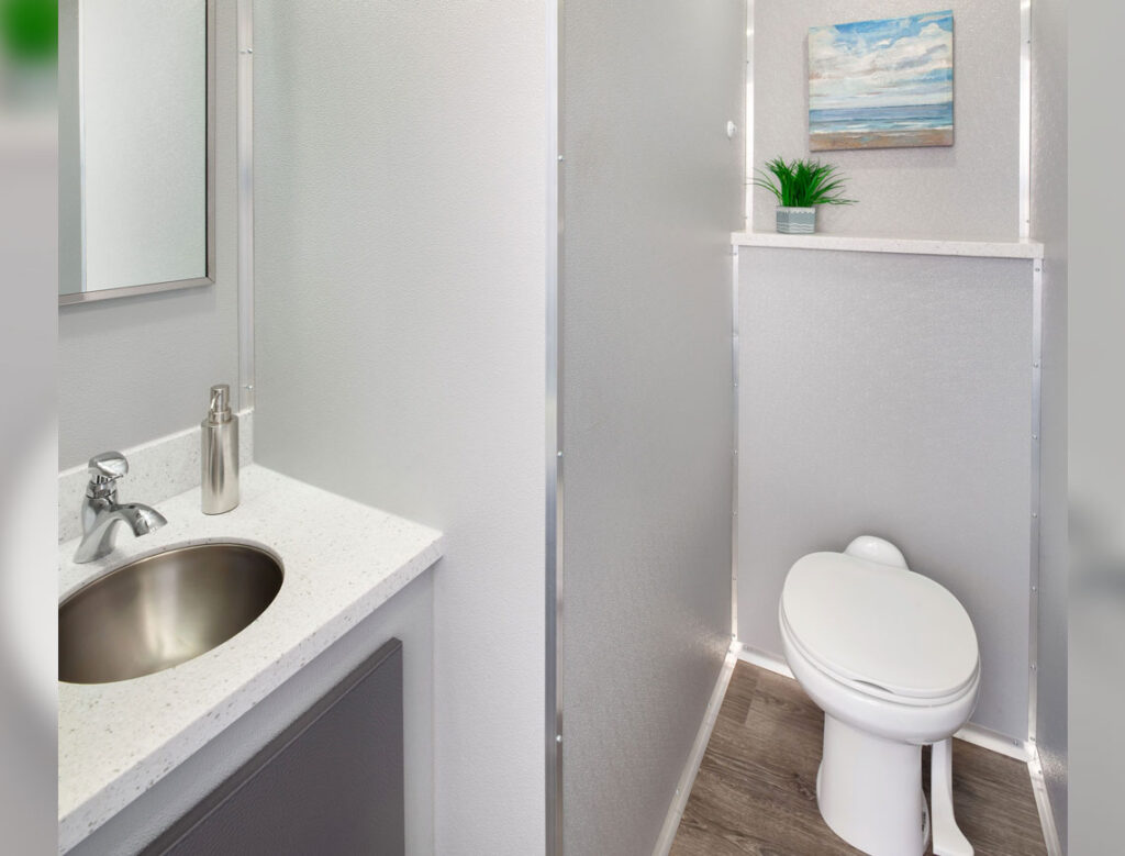 Modern bathroom with sink and artwork