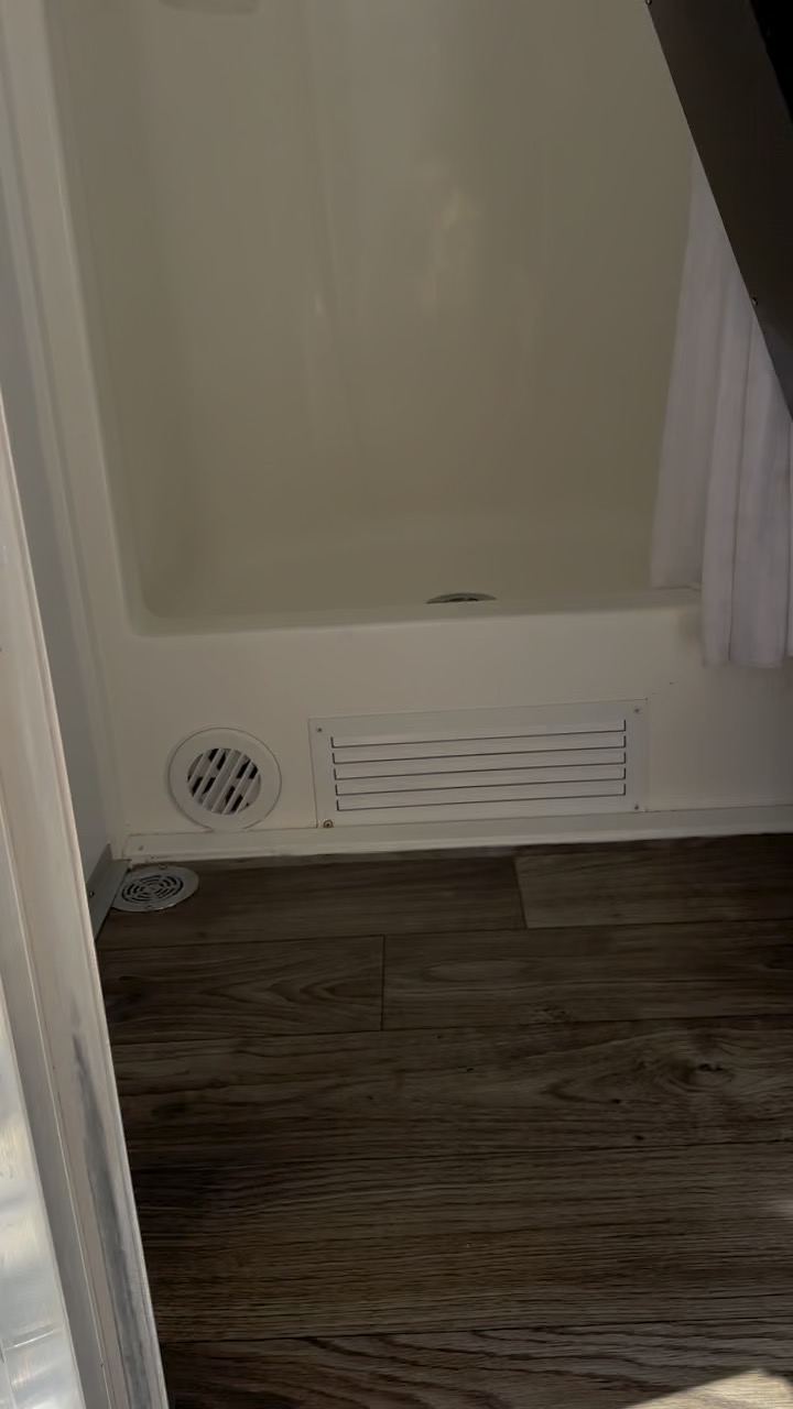 Interior shower stall of a Stahla shower trailer