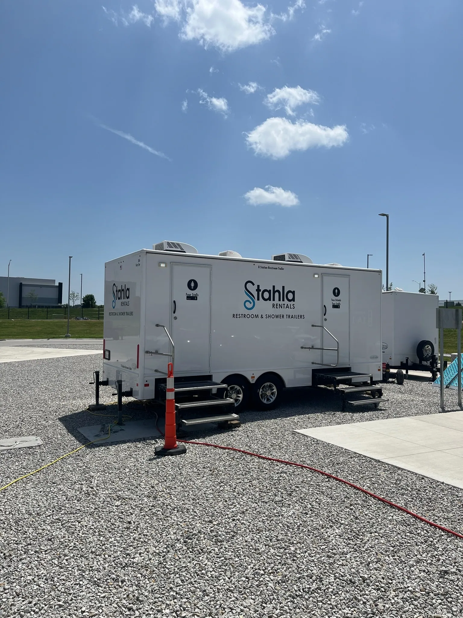 Restroom & shower combo trailer — on site for a Stahla job