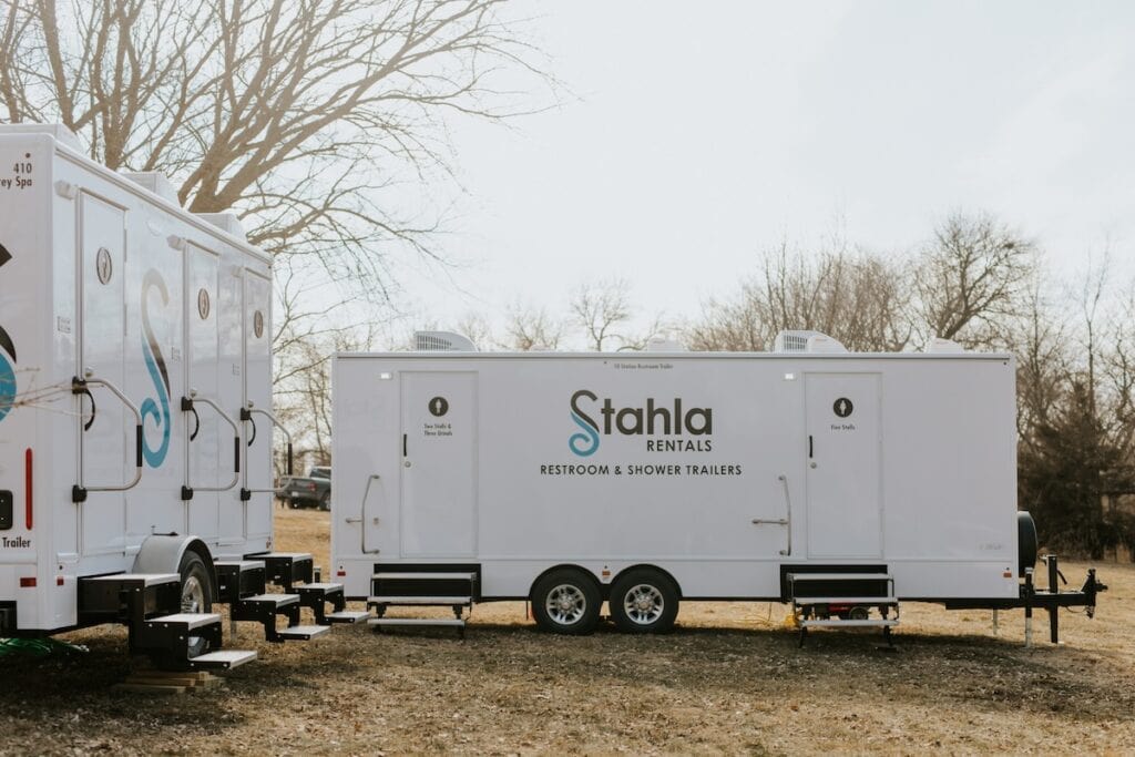 Stahla Rentals mobile restroom and shower trailers parked outdoors.