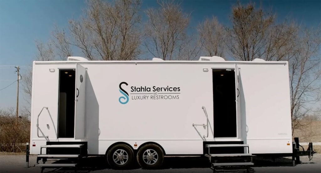 Stahla Services luxury 10 Stall restroom trailer parked outdoors.