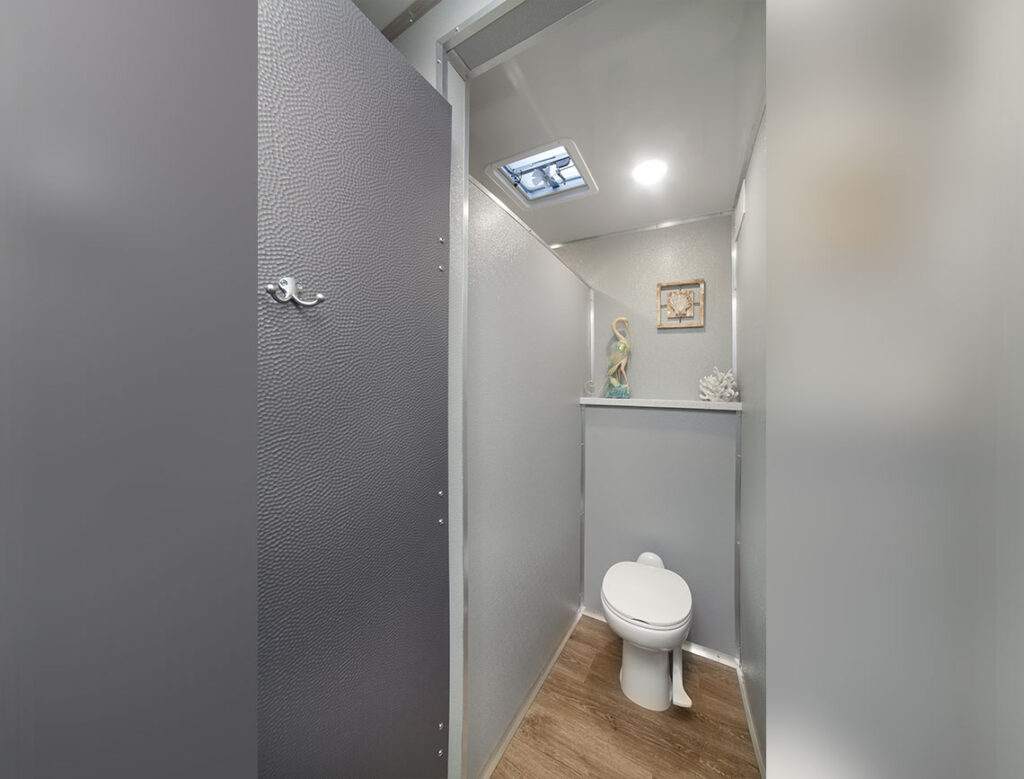 Modern small bathroom interior with decorative elements.