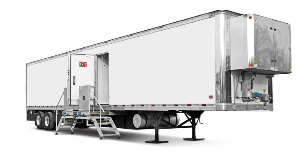 Semi-truck trailer with stairs and exit door.