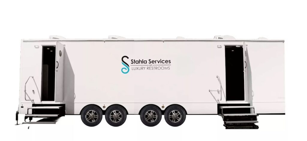 White luxury 16 Station restroom trailer with Stahla Services company logo.