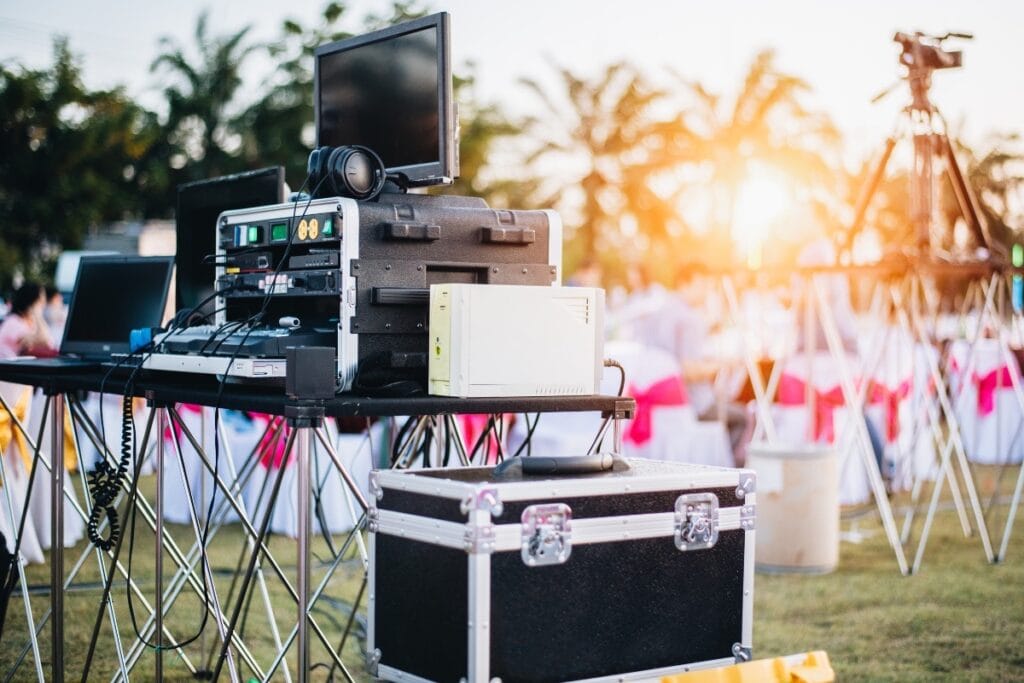 Outdoor event audio and video equipment setup.