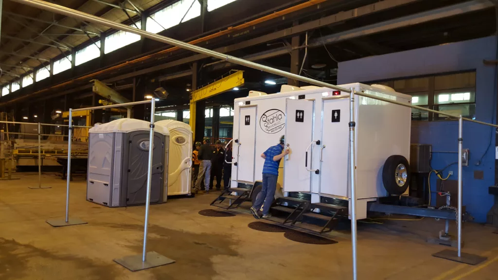 Portable restrooms at an industrial facility.
