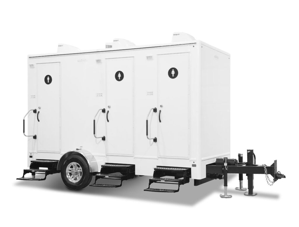 Mobile restroom trailer with multiple units.