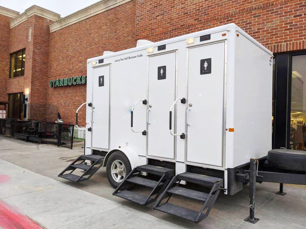 Mobile 4 Stall restroom trailer outside Starbucks.