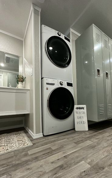 Stacked washer and dryer in modern laundry room