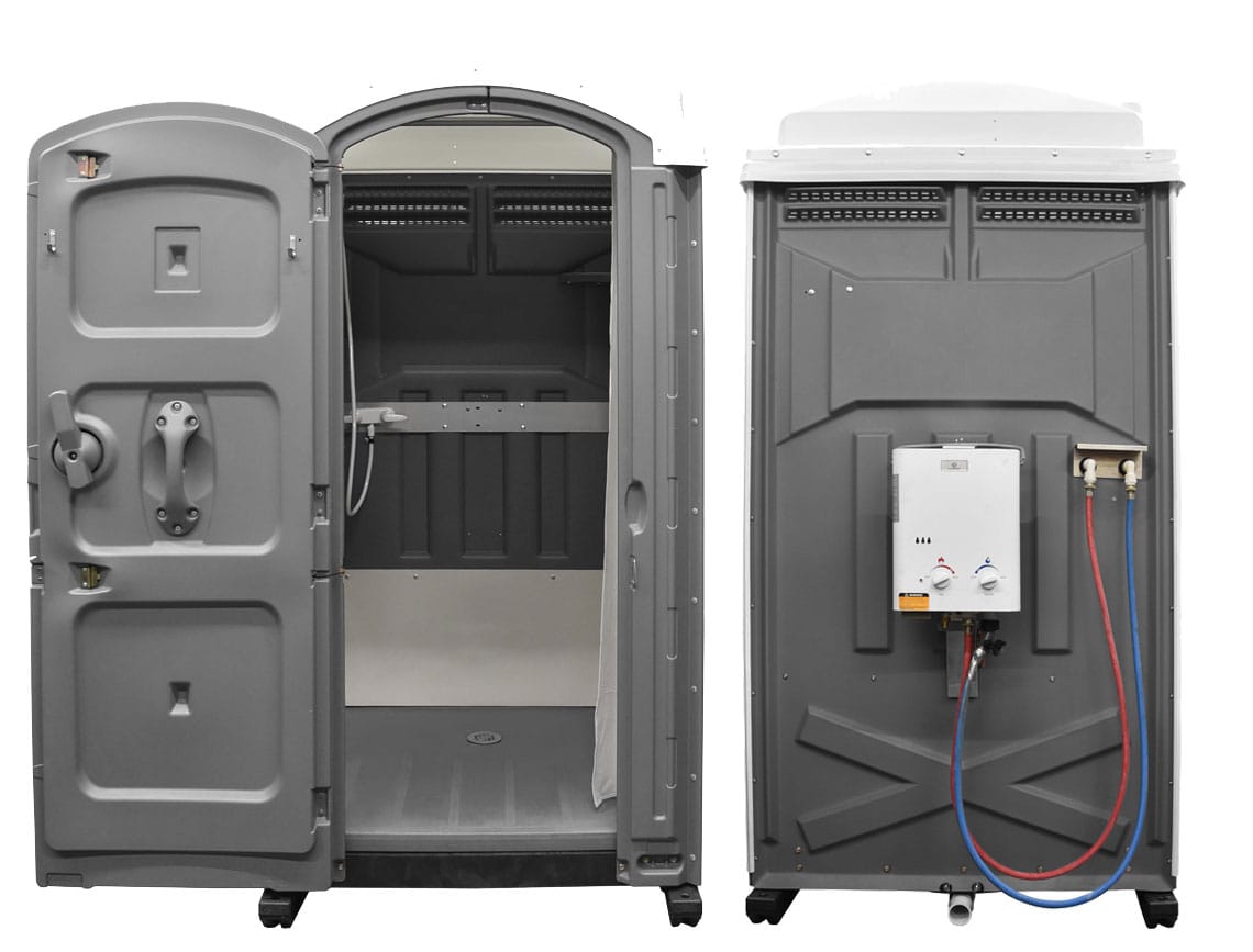 Portable restrooms with open doors and visible interiors.