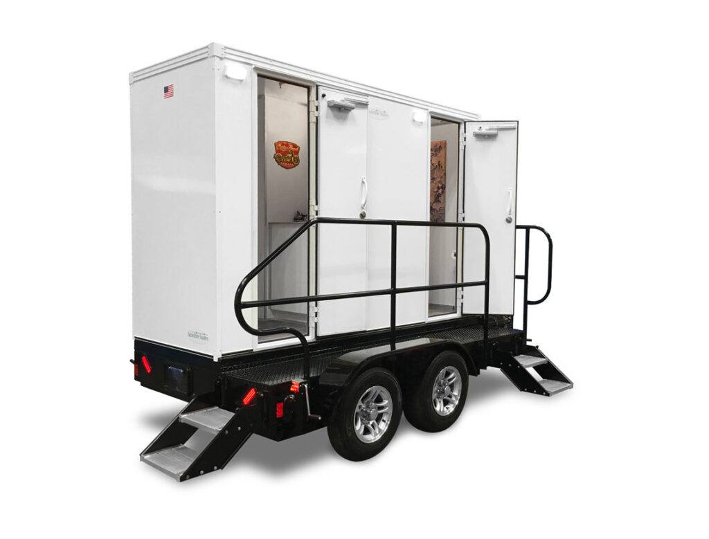 Mobile restroom trailer on white background